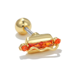 Macro detail of 18k gold hot dog cartilage stud with red and orange gemstones