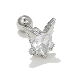Macro view of heart-shaped zircon ear stud with silver angel wings and screw-back ball