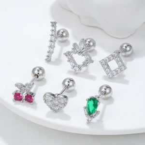 Minimalist silver heart stud earrings set with colorful cubic zirconia and screw ball backs