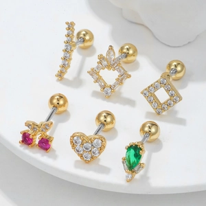 Minimalist gold heart stud earrings set with colorful cubic zirconia and screw ball backs