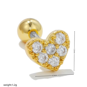 Detailed macro view of gold heart stud earring with zircon inlay measuring 5.5mm x 6.5mm