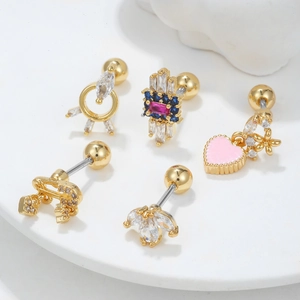 Five unique gold-plated heart and flower stud earrings set with vibrant cubic zirconia