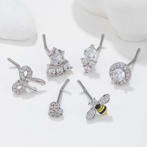 Set de 6 piercings de nariz con lazo y abeja en acero inoxidable y circonitas
