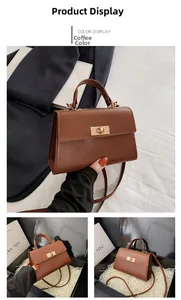Detail of coffee brown leather handbag with gold twist lock and adjustable strap