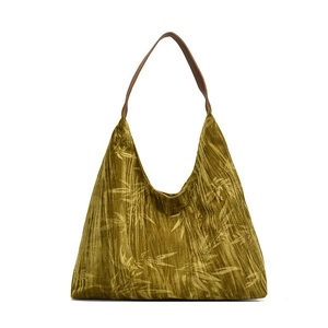 Oriental style mustard yellow tote bag with bamboo leaf pattern and leather straps