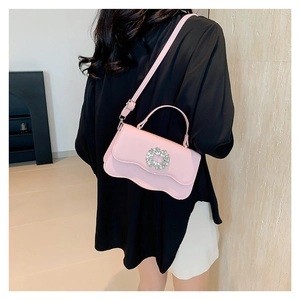 Pink rhinestone buckle shoulder bag with unique wavy bottom and adjustable strap for women