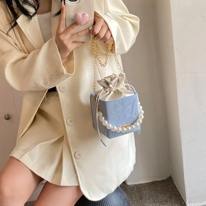 Blue cube bucket bag with pearl handle and silk drawstring closure for women