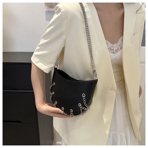 Black half-moon shoulder bag with silver hanging chains and metal strap for women