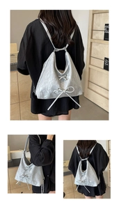 Detailed views of a silver metallic tote bag with decorative bow and versatile straps