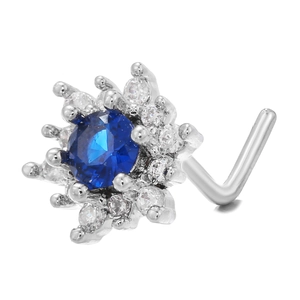 Macro view of L-shaped titanium steel nose stud with blue snowflake zircon cluster detail