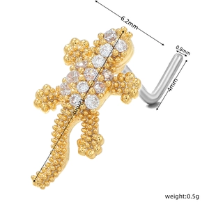 Detailed view of lizard nose stud with gold plating and cubic zirconia inlay