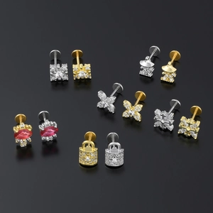 Various flat back stainless steel ear studs in gold and silver with zircon accents