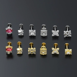 12-piece stainless steel labret set with zircon butterfly and geometric stud designs