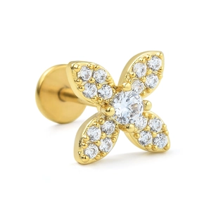 Macro view of gold flower cartilage earring with white zircons and flat back design