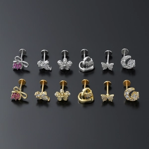 Geometric stud earrings with butterfly and floral diamond designs in gold and silver finish