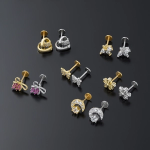 Collection of geometric butterfly and flower stud earrings in gold and silver plating