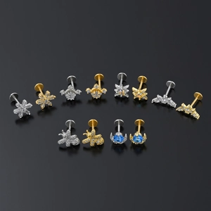 Flat back stainless steel stud earrings set with blue crystals and geometric shapes
