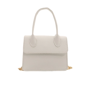 Minimalist beige pebble leather handbag with curved handle and gold chain detail