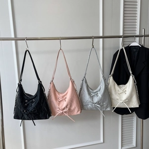 Hobo bags in black pink silver and white with bow details and chain straps