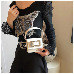 Mini white leather crossbody bag with silver bow buckle and golden chain strap