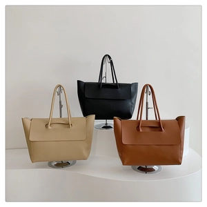 Minimalist leather tote bag for women in black, beige, and brown color options