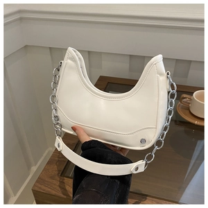 Chic cream white half-moon shoulder bag with silver chain strap and metal rivet details
