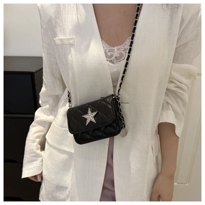 Quilted mini crossbody bag with silver rhinestone star and classic metal chain strap