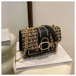 Close-up of tricolor tweed texture, golden clasp, and chain strap of the flap crossbody bag