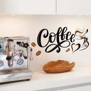 Detailed view of coffee wall decals showing artistic lettering and latte cup on kitchen wall