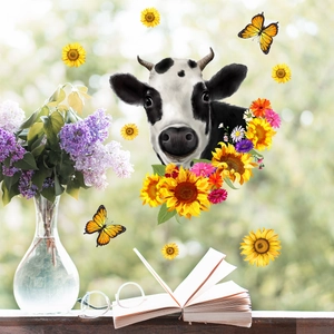 Close-up of cow and sunflower wall decals on glass window with aesthetic room decor