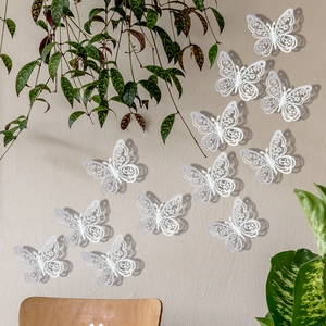 Set de 12 mariposas decorativas 3D blancas con patrones calados para decoración de pared