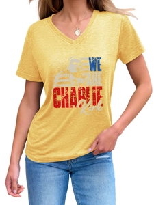 Close-up of V-neck yellow cotton T-shirt featuring We Are Charlie Kirk portrait print