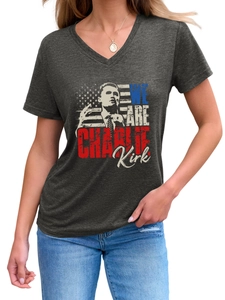 Detail of charcoal grey V-neck T-shirt featuring Charlie Kirk and American flag print