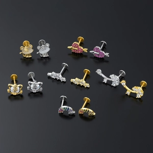 Stainless steel labret and cartilage earrings with tiger, heart and flower designs
