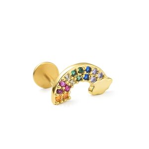 Close-up of golden rainbow stud with colorful gems and cloud detail on a white background