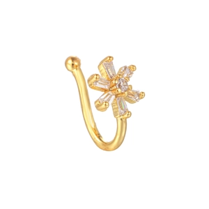 Detail of flower non-pierced nose clip with sparkling cubic zirconia in a gold U-shape