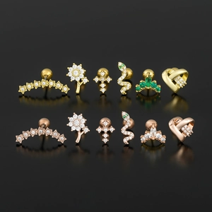 Orecchini a cartilagine con corona e stella in zircone, finiture oro e oro rosa