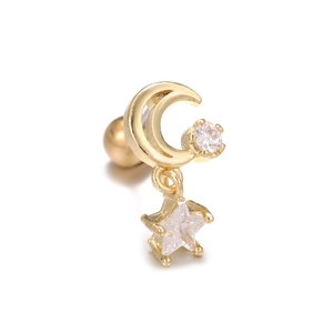 Detail of gold crescent moon and star zircon earrings with spherical screw backings