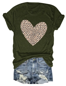 Detail of dark green t-shirt with leopard heart print and frayed denim shorts