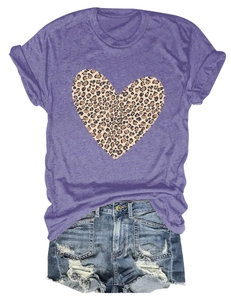 Detail of purple T-shirt with leopard print heart and distressed denim shorts