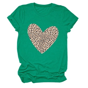 Detailed view of emerald green T-shirt with leopard print heart on cotton fabric