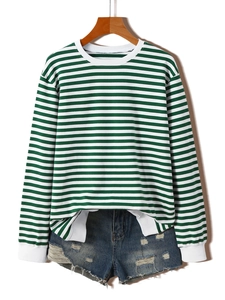 Detail of green and white striped sweatshirt featuring ribbed cuffs and crew neckline