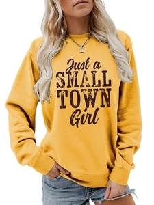 Detail of ginger yellow crewneck sweatshirt with Just a SMALL TOWN Girl print