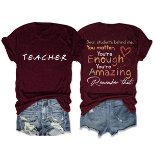 Detailed front and back view of burgundy teacher t-shirt with inspirational quote print