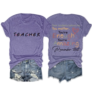 Detail of purple crewneck teacher t-shirt and frayed denim shorts summer outfit set