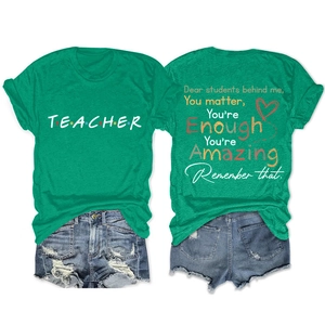 Front and back view of green cotton T-shirt with teacher text and denim shorts set