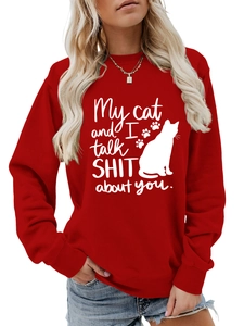 Detail of red crewneck sweatshirt featuring white My cat and I talk SHIT about you print