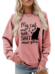 Detail of the humor cat slogan and paw prints on the dusty rose crewneck sweatshirt