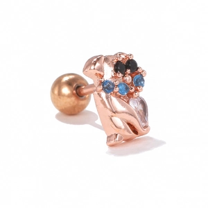 Macro view of rose gold puppy stud earring with zircon stones and screw ball back
