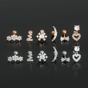 Minimalist heart and star stud earrings set with zircon stones in rose gold and silver
